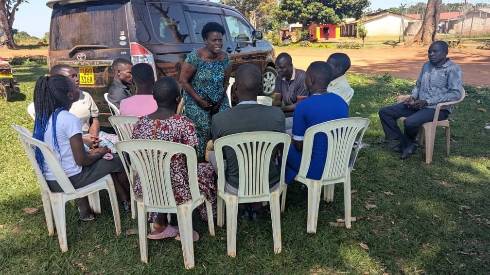 Turikumwe outreach team meeting with community members in Kasangati