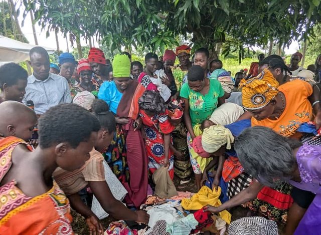 Turikumwe volunteers on a community home-visit and outreach day